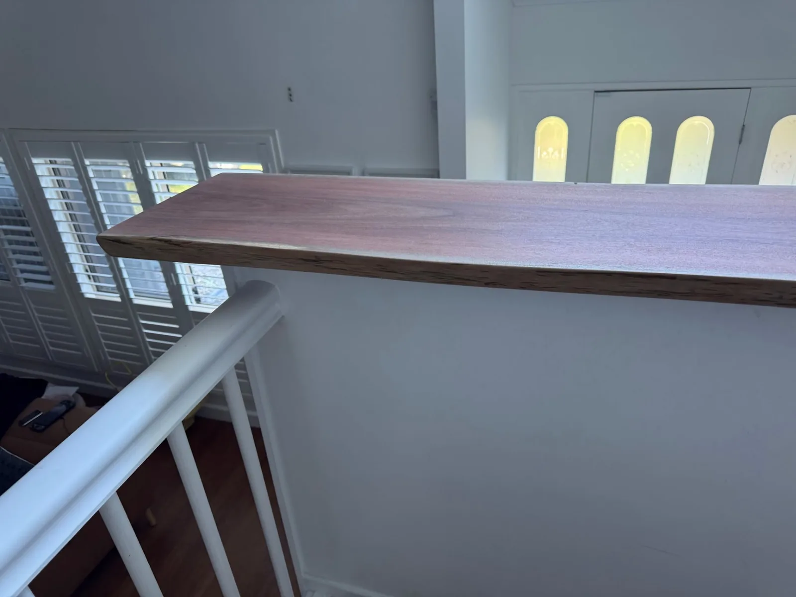 Solid timber feature integrated with existing staircase in Carina