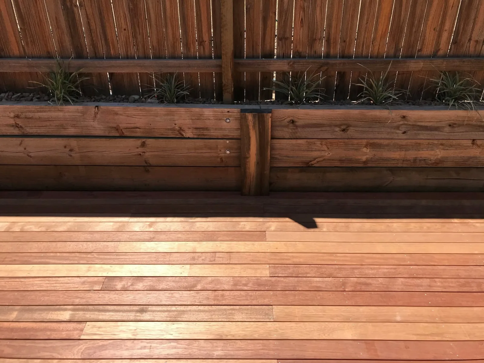 Hardwood timber deck and timber retaining planter in Parkinson